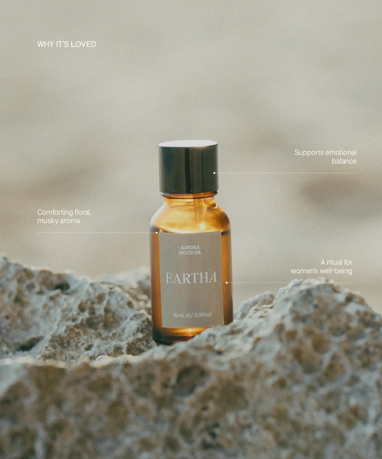 Eartha essential oil bottle on a textured surface with text about its benefits.